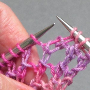 Drop both the first and second stitches from the left-hand needle.