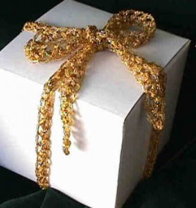 Knitted Ribbon in chained metallic gold yarn