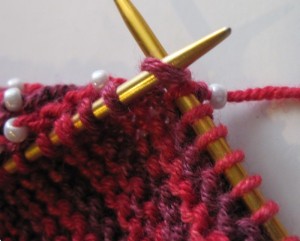 Beads do not show on wrong side of beaded garter stitch