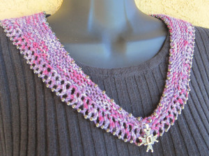Beaded Crescent Neck Lace worn pinned at front