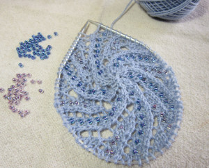 Knitting a beaded variation of Lace Doily Beret
