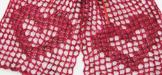 knitted filet lace with heart motifs