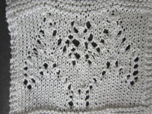 Upside down lace bat made from just knitting the rows in reverse order