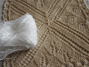 comparison of white thread to after being dyed with tea